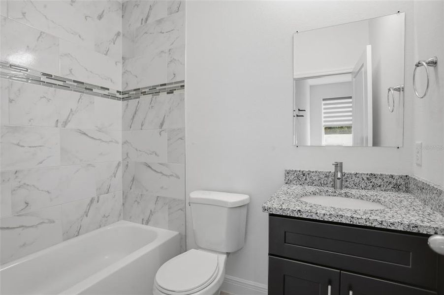 Furnished interior view inside a new home in , Kissimmee (Image 12).