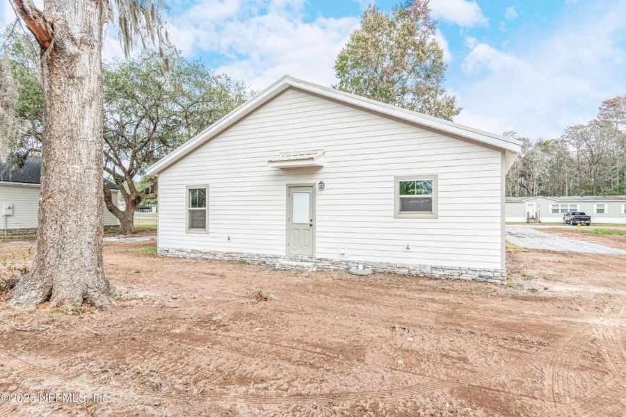 Exterior details and patio area of a home in , Glen St. Mary (Image 3).