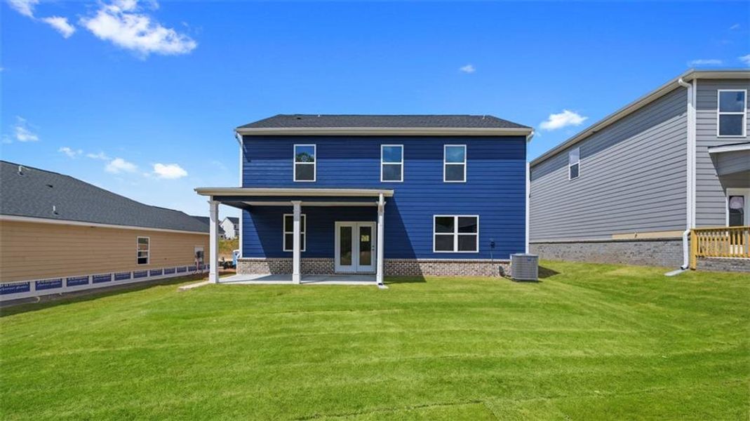 Exterior details and patio area of a home in Twin Lakes, Hoschton (Image 3).