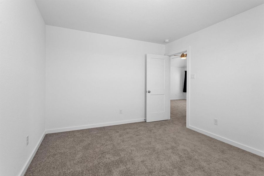 This alternate view of the upstairs secondary bedroom.