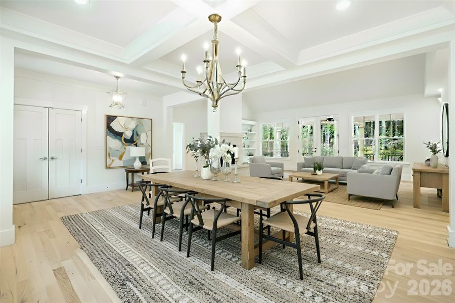 Dining room looking towards living room (virtually staged) Dining room looking towards living room (virtually staged)
