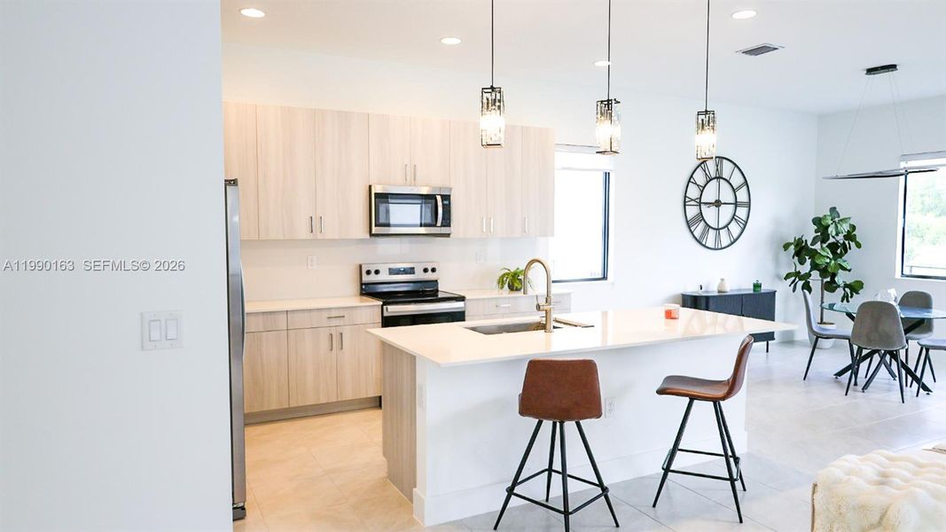 Furnished interior view inside a new home in , Ave Maria (Image 5).