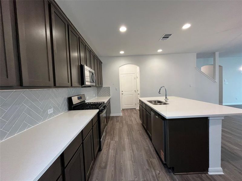 Furnished interior view inside a new home in Wellspring, Round Rock (Image 6).