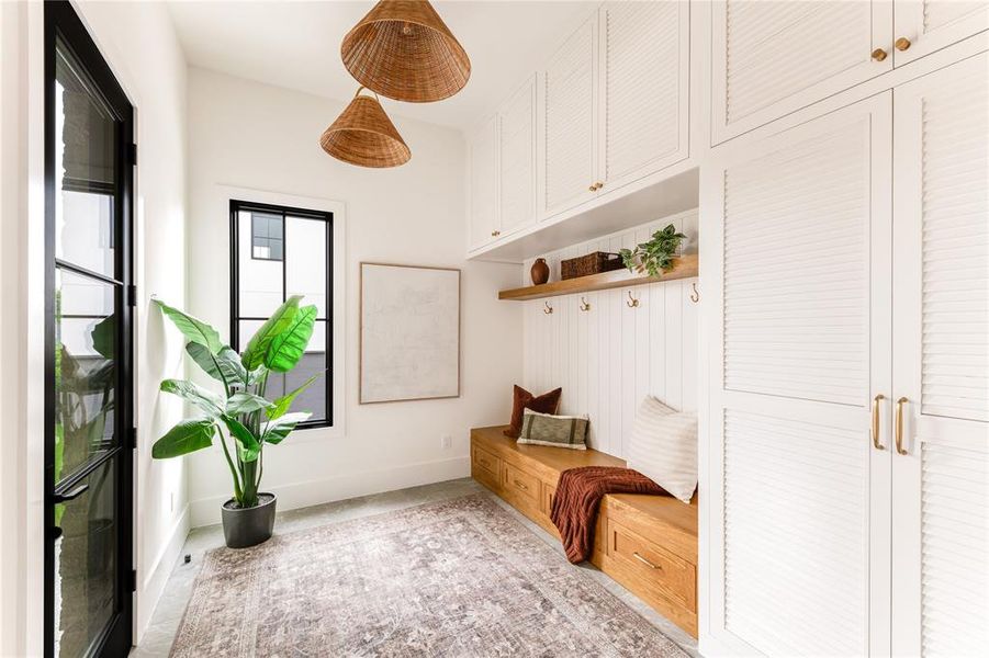 Mudroom featuring baseboards