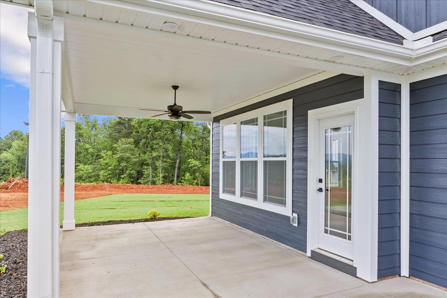 Representative exterior details of a home built from the Converse Elite by Enchanted Homes in Pointe Summit, Slater-Marietta (Image 4).