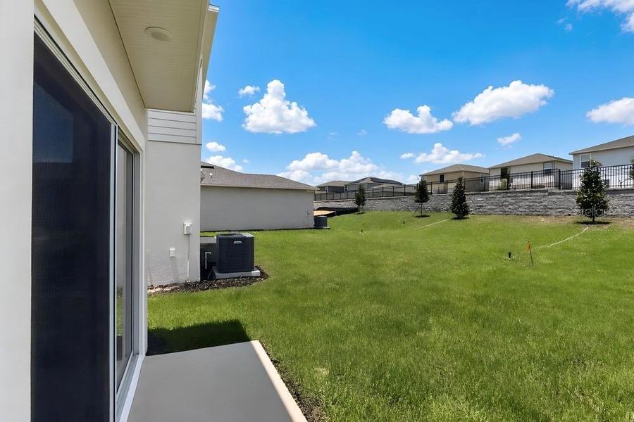 Exterior details and patio area of a home in Waterstone, Groveland (Image 3).