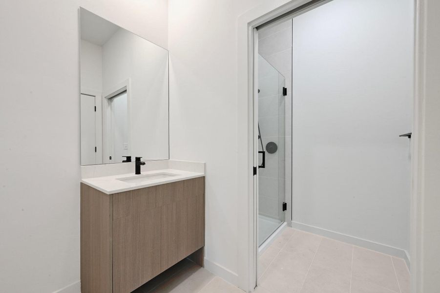 Furnished interior view inside a new home in One Oak, Austin (Image 8).