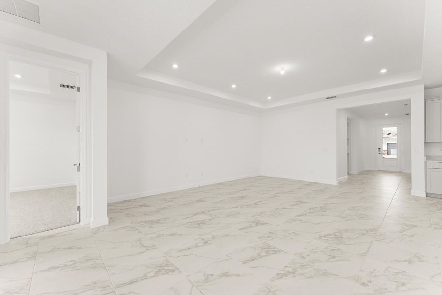 Spacious, unfurnished interior of a new home in Tradition - Telaro, Port St. Lucie (Image 9).