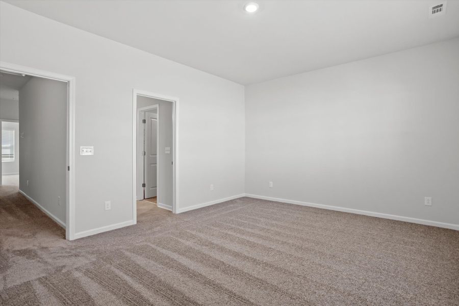 Spacious, unfurnished interior of a new home in West Main Townhomes, Sanford (Image 22).
