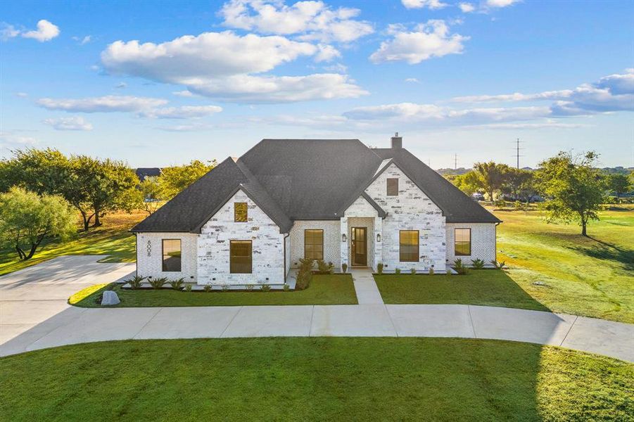 Brand new construction rarely features so many sparkling and perfectly selected finishes; the circle driveway out front doesn't hurt, either!