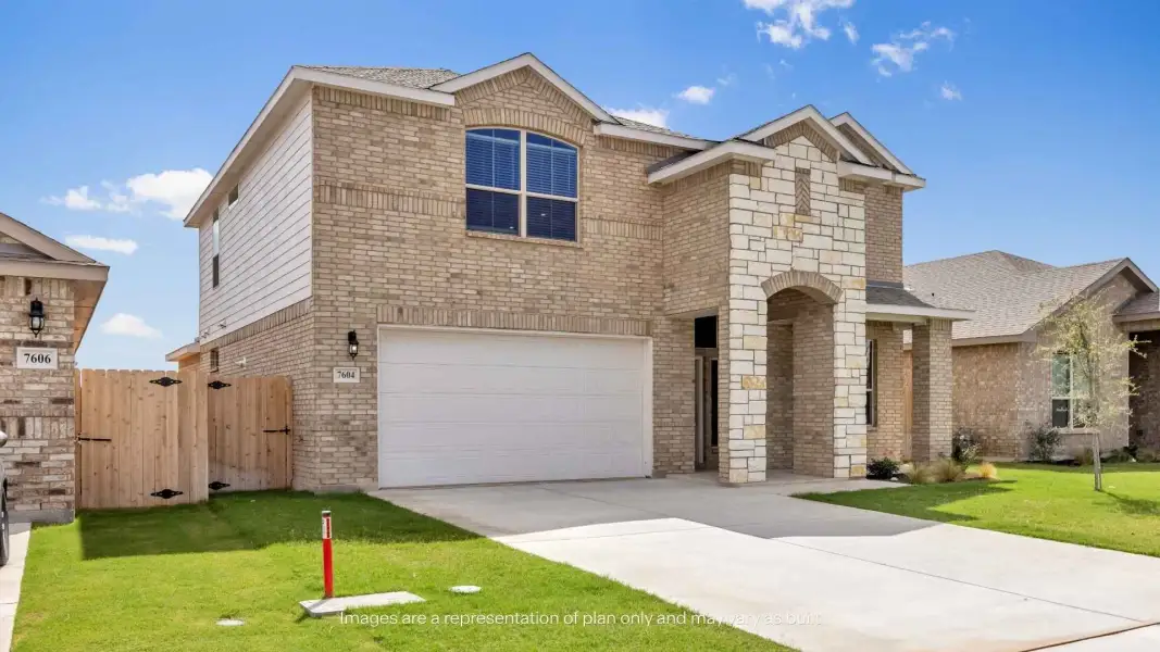 Front exterior of a new home in Homestead at Parks Bell Ranch, Odessa, TX, highlighting curb appeal (Image 17). Front exterior of a new home in Homestead at Parks Bell Ranch, Odessa, TX, highlighting curb appeal (Image 17).