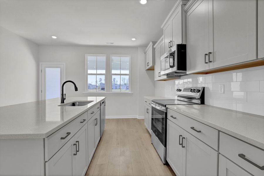 Furnished interior view inside a new home in Grand Park, Leland (Image 8).