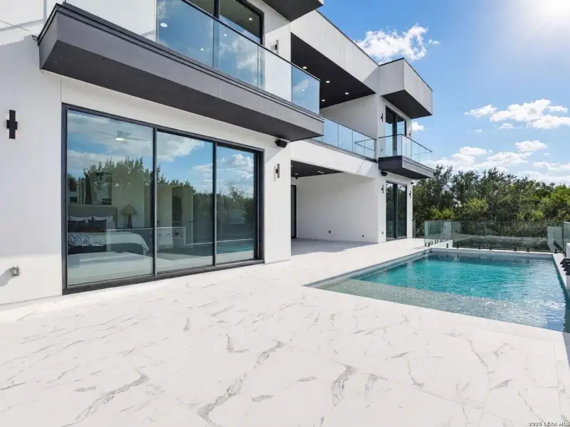 Exterior details and patio area of a home in , San Antonio (Image 32).