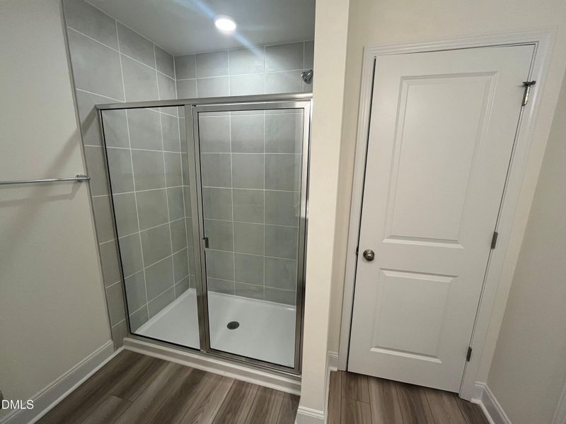 nfs 15 Primary bath with walk in tiled s nfs 15 Primary bath with walk in tiled s