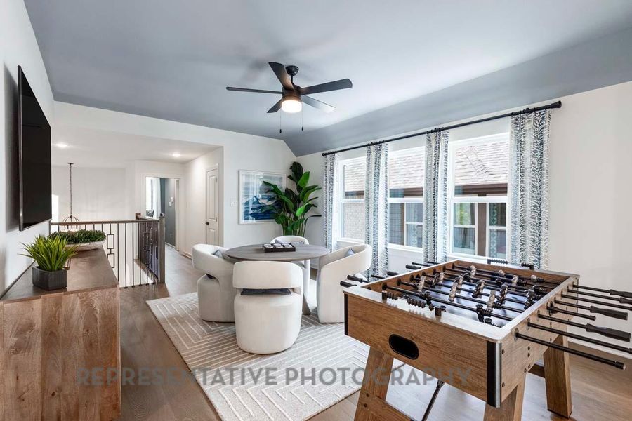 Playroom featuring wood finished floors and ceiling fan