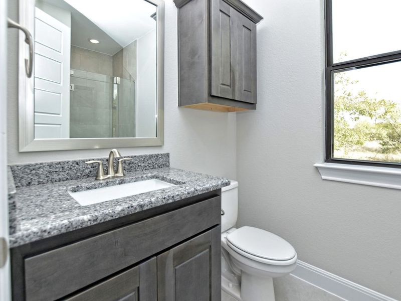 Representative furnished interior of a home built from the Madera II by Giddens Homes in Scofield Farms Estates, Georgetown (Image 182).