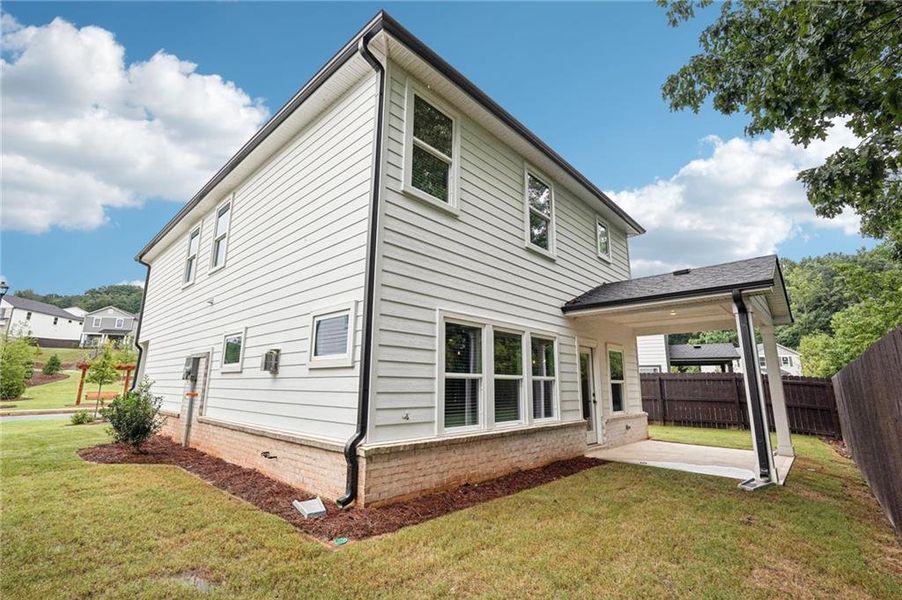 Exterior details and patio area of a home in Hemingway - Reserve Series, Cumming (Image 24).