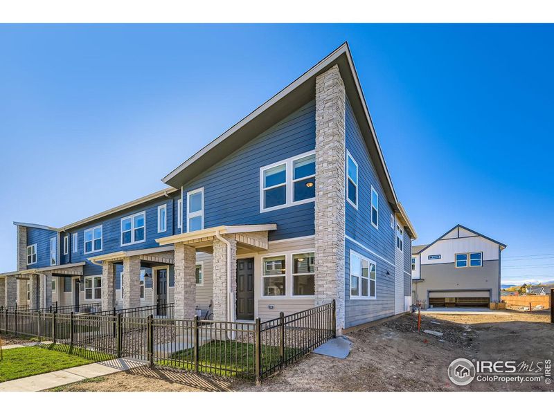 Front entry with a private, fenced in front yard. Landscaping covered by HOA! Front entry with a private, fenced in front yard. Landscaping covered by HOA!