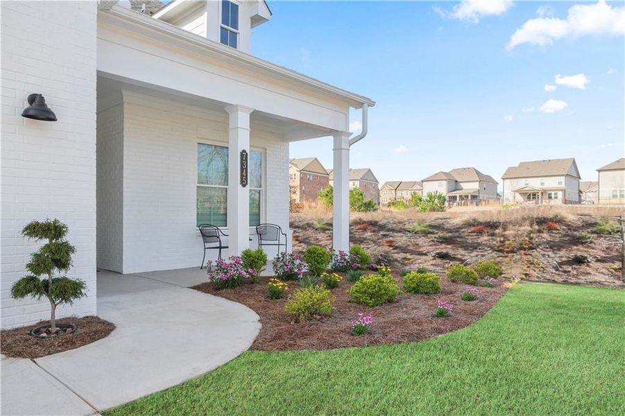 Exterior details and patio area of a home in Courtyards at Traditions, Cumming (Image 3).