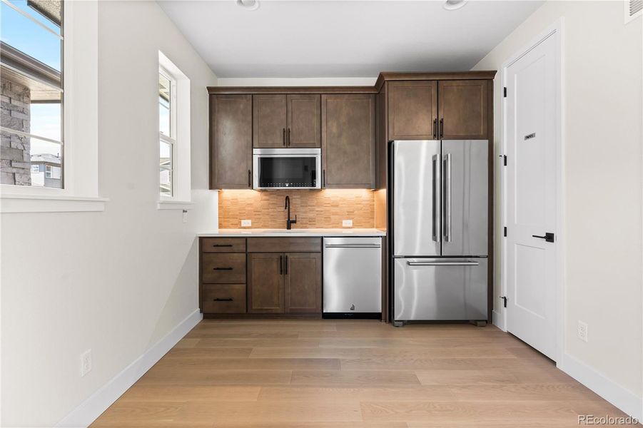 Furnished interior view inside a new home in Luxe at The Canyons, Castle Pines (Image 14).