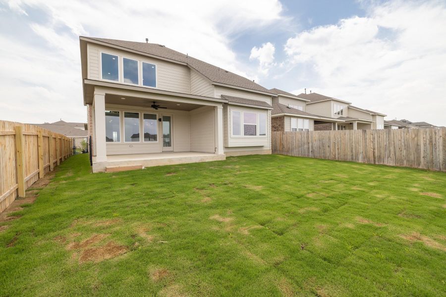 Exterior details and patio area of a home in Santa Rita Ranch, Liberty Hill (Image 19).