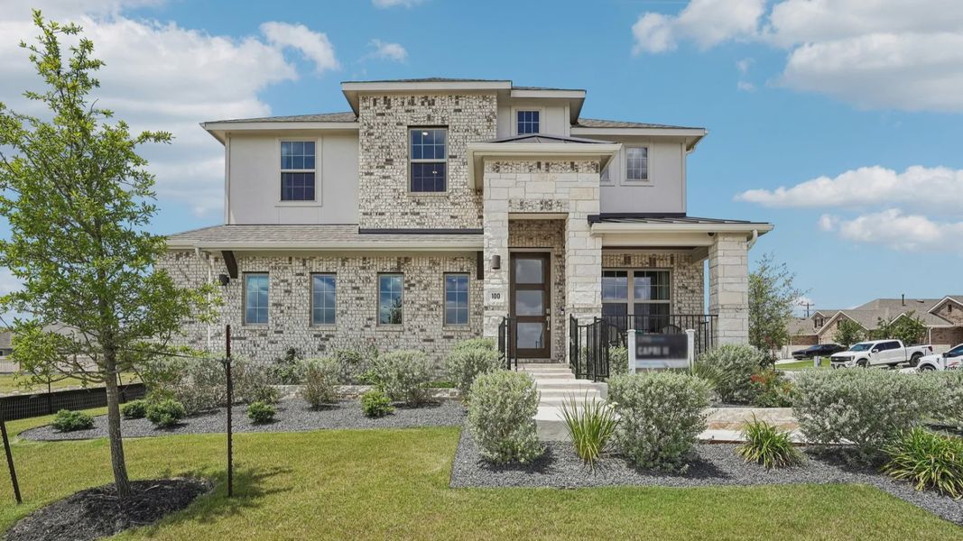 Representative exterior photo of a completed home built from the Capri II by DRB Homes in Opal Ranch, Kyle, TX (Image 21). Representative exterior photo of a completed home built from the Capri II by DRB Homes in Opal Ranch, Kyle, TX (Image 21).