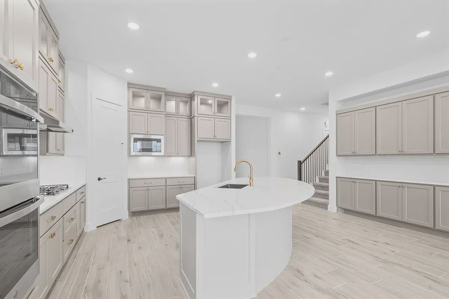 Representative furnished interior of a home built from the Madison by Chesmar Homes in Grange, Katy (Image 8).
