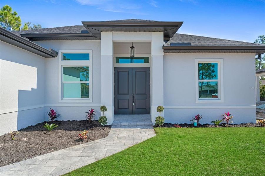 Exterior details and patio area of a home in , North Port (Image 18).