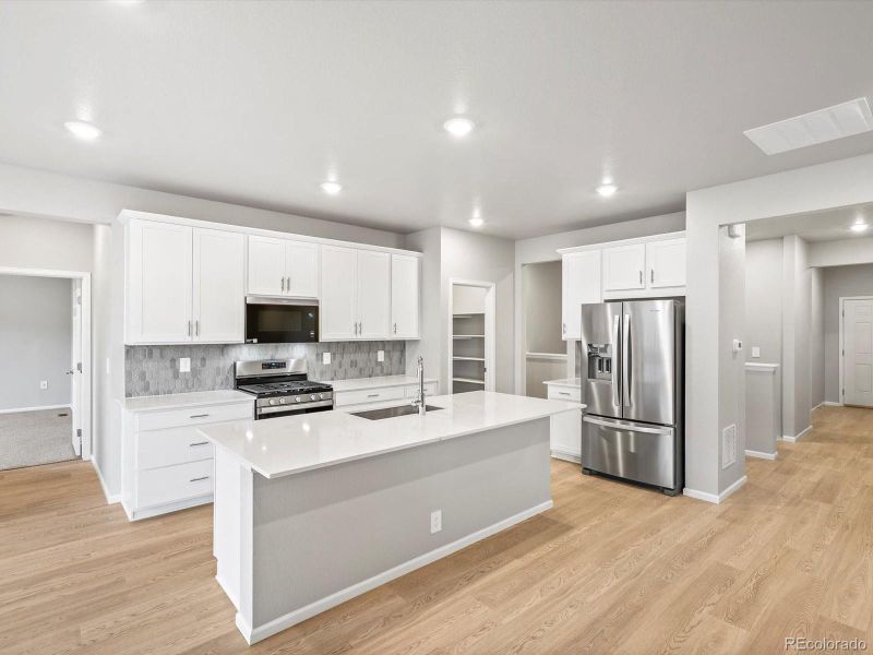 Furnished interior view inside a new home in Poudre Heights: The Alpine Collection, Windsor (Image 6).