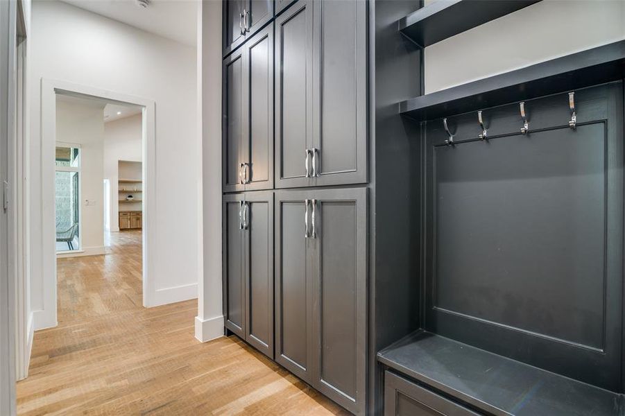 Mudroom featuring light wood-type flooring