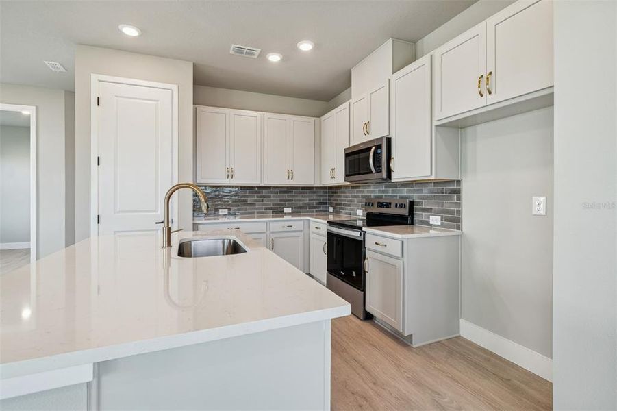 Furnished interior view inside a new home in North River Ranch – Townhomes, Parrish (Image 7).