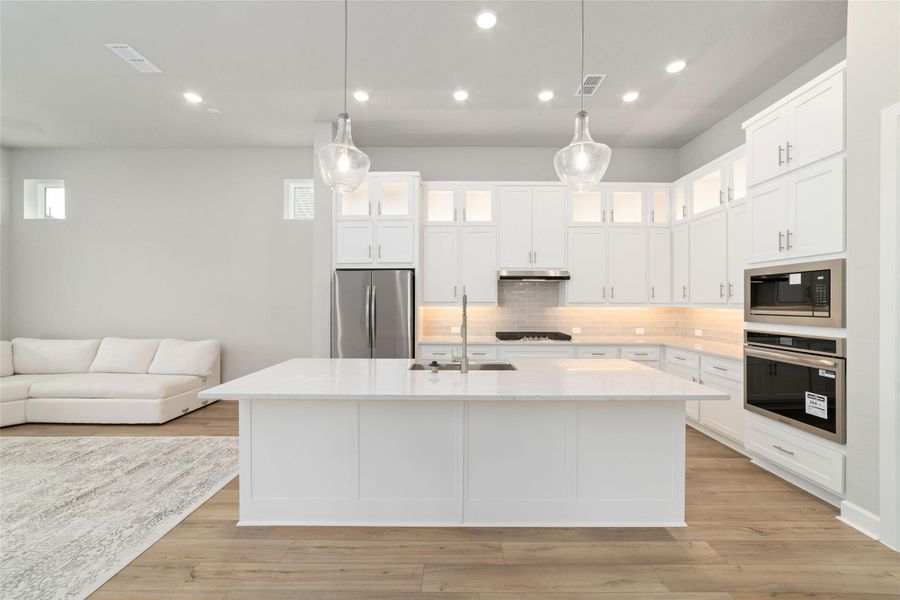 Furnished interior view inside a new home in Harvest Green - Reserve Collection, Richmond (Image 10).