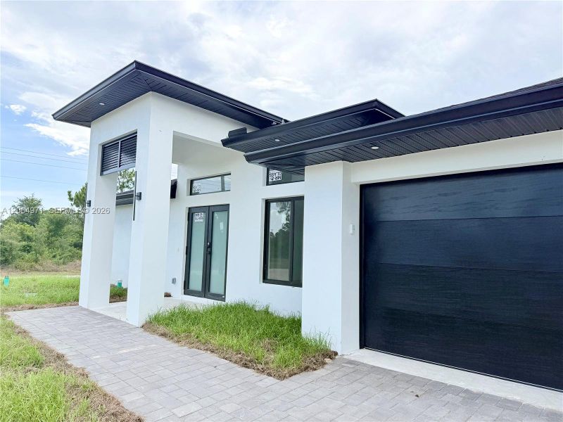 Exterior details and patio area of a home in , Lehigh Acres (Image 3).