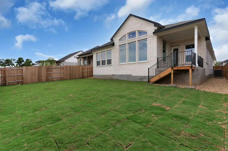 Exterior details and patio area of a home in University Heights, Round Rock (Image 4).