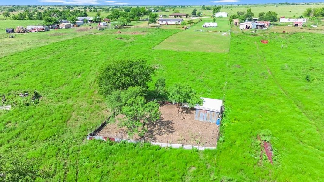 Aerial view of livestock pin and barn Aerial view of livestock pin and barn