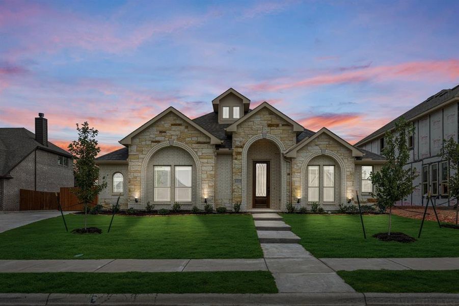 Front exterior of a new home in Ridgepoint, Midlothian, TX, highlighting curb appeal (Image 1). Front exterior of a new home in Ridgepoint, Midlothian, TX, highlighting curb appeal (Image 1).