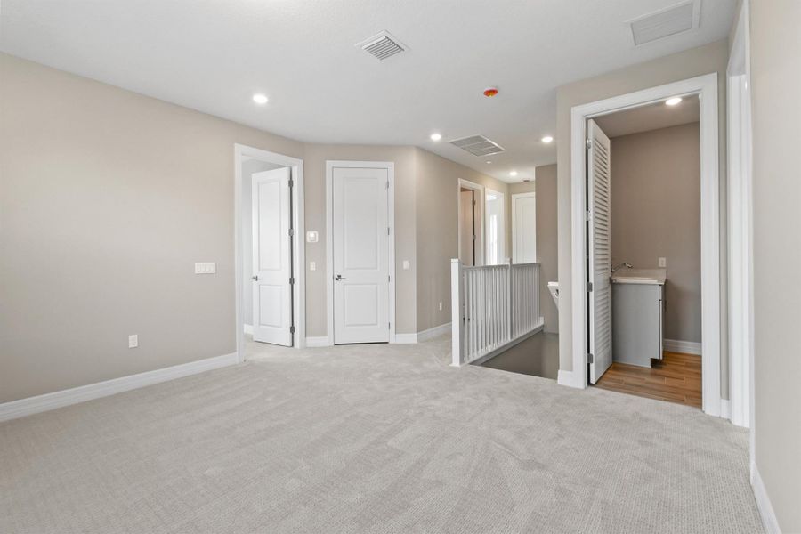 Furnished interior view inside a new home in Avondale at Avenir, Palm Beach Gardens (Image 19).