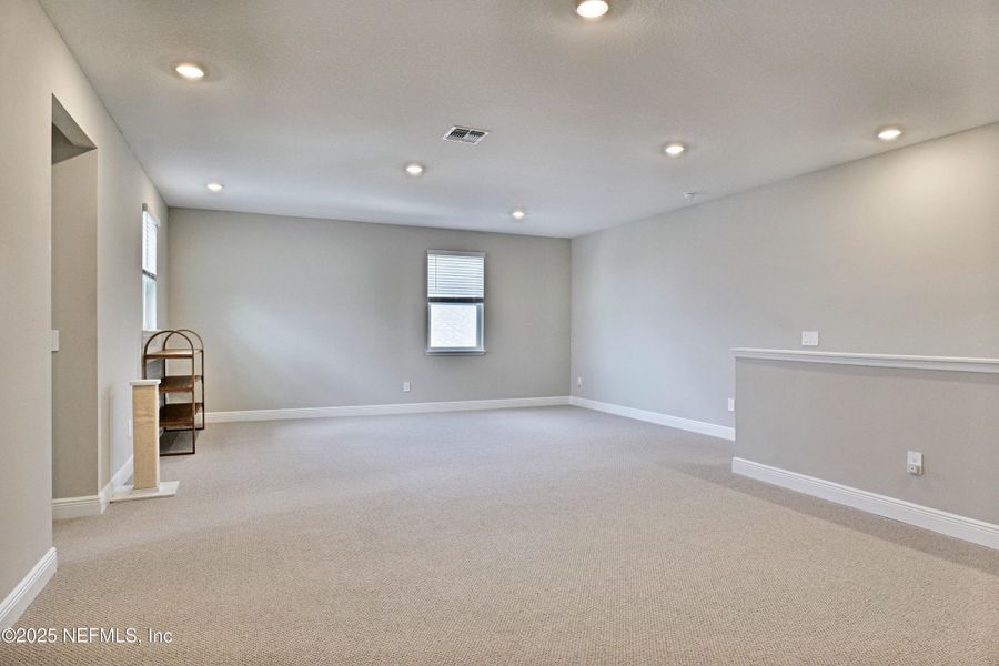 Spacious, unfurnished interior of a new home in Legends Preserve - Reserve Series, Daytona Beach (Image 23).