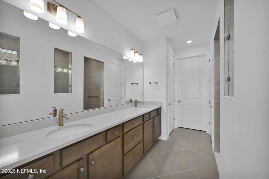 Furnished interior view inside a new home in Summer Bay at Grand Oaks, St. Augustine (Image 11).