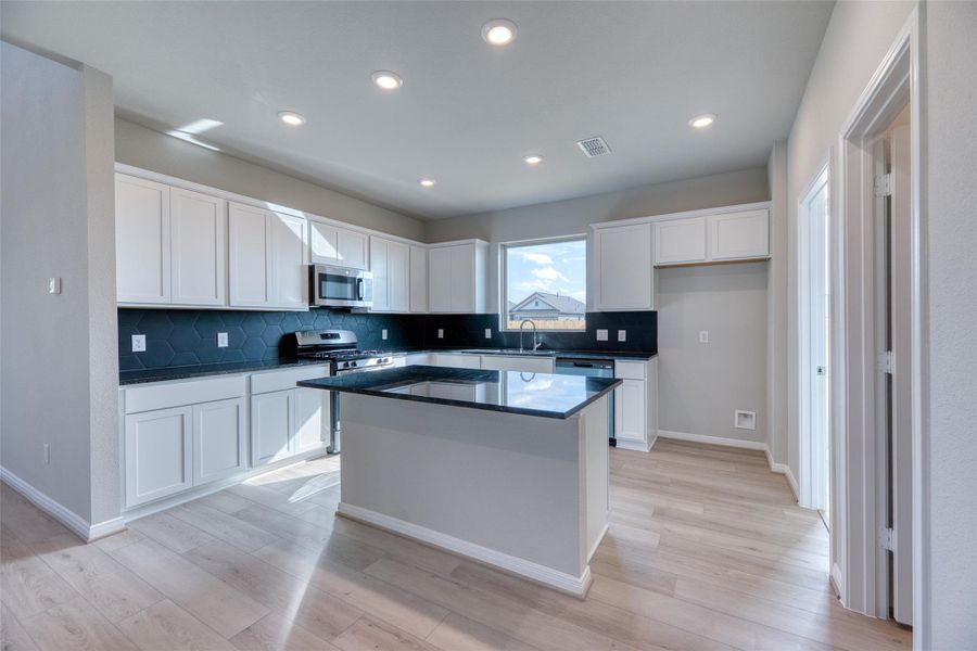 Furnished interior view inside a new home in Aldeana - Tejas Collection, Bonney (Image 9).