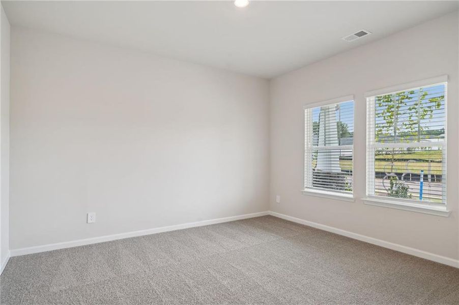 Spacious, unfurnished interior of a new home in Vines at Mill Creek - Estate Series, Braselton (Image 17).