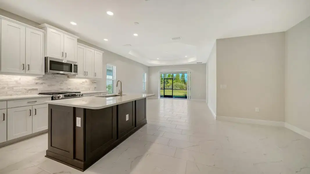 Furnished interior view inside a new home in Windward Real Estate and Homes for Sale in Sarasota, FL - Neal Communities, Sarasota (Image 8). Furnished interior view inside a new home in Windward Real Estate and Homes for Sale in Sarasota, FL - Neal Communities, Sarasota (Image 8).