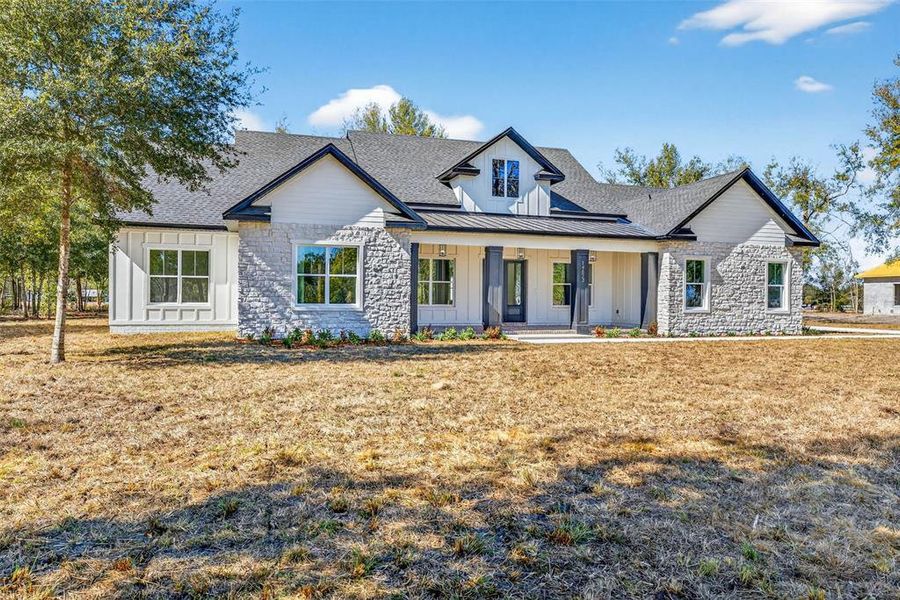 Front exterior of a new home in , Dade City, FL, highlighting curb appeal (Image 27). Front exterior of a new home in , Dade City, FL, highlighting curb appeal (Image 27).