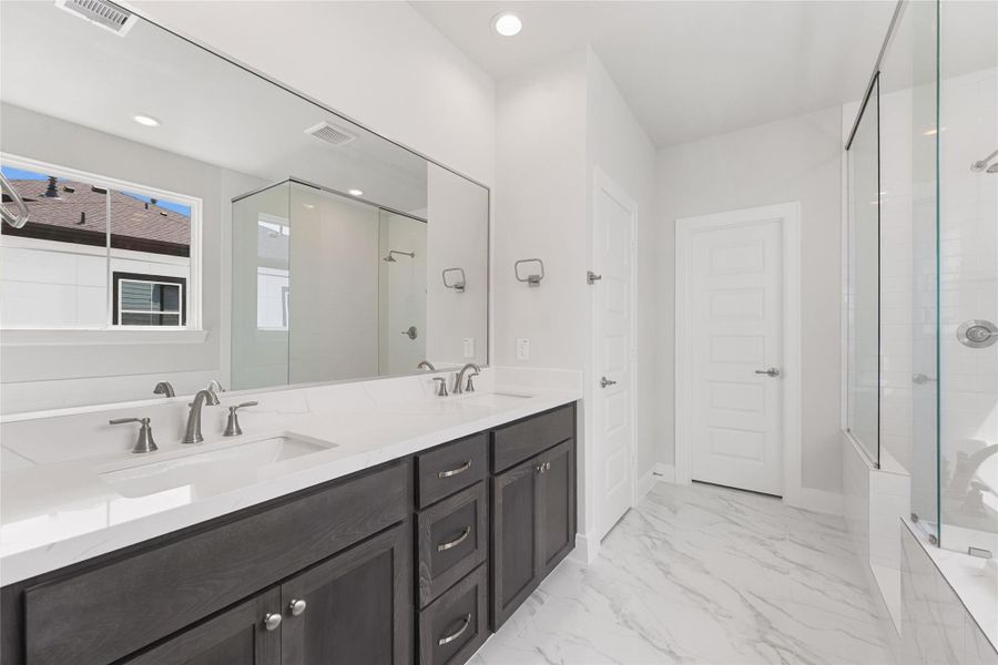 Furnished interior view inside a new home in The Corner At Buffalo Pointe, Houston (Image 5).