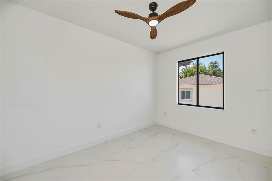 Spacious, unfurnished interior of a new home in , Port Charlotte (Image 26).