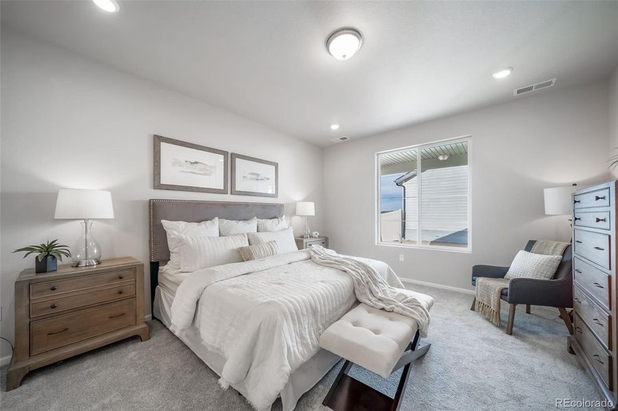 Furnished interior view inside a new home in The Reserve, Aurora (Image 7).