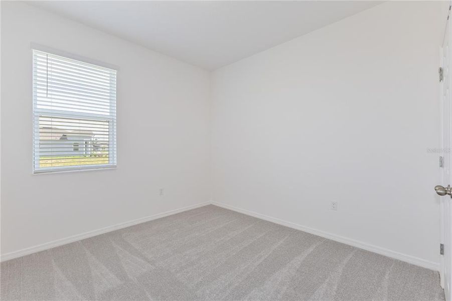 Spacious, unfurnished interior of a new home in Highfield at Twisted Oaks, Wildwood (Image 12).