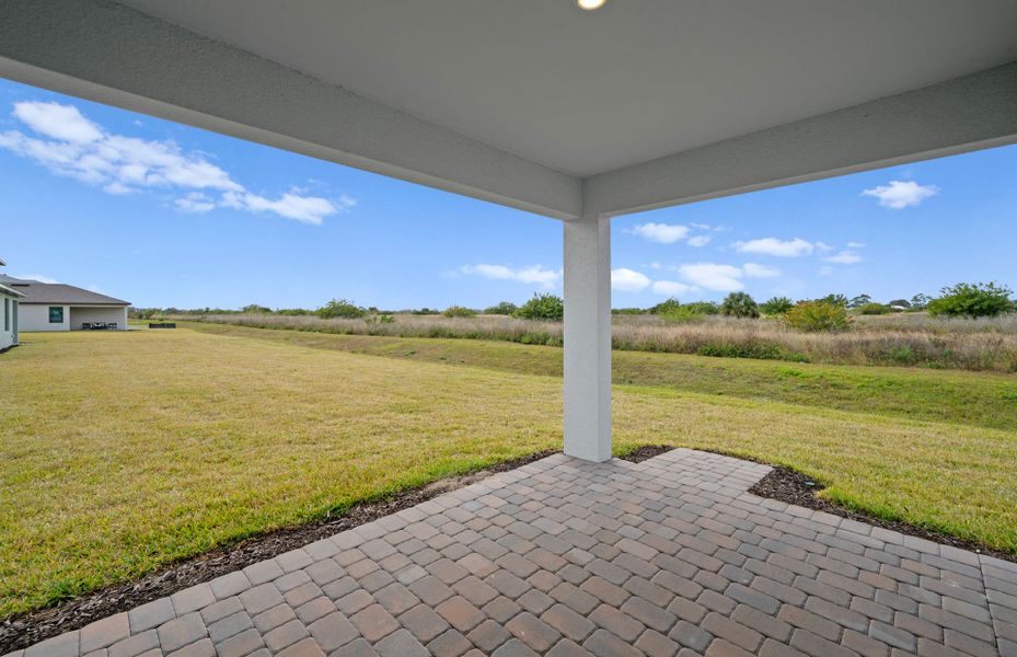 Exterior details and patio area of a home in Whispering Lakes, Lehigh Acres (Image 2). Exterior details and patio area of a home in Whispering Lakes, Lehigh Acres (Image 2).