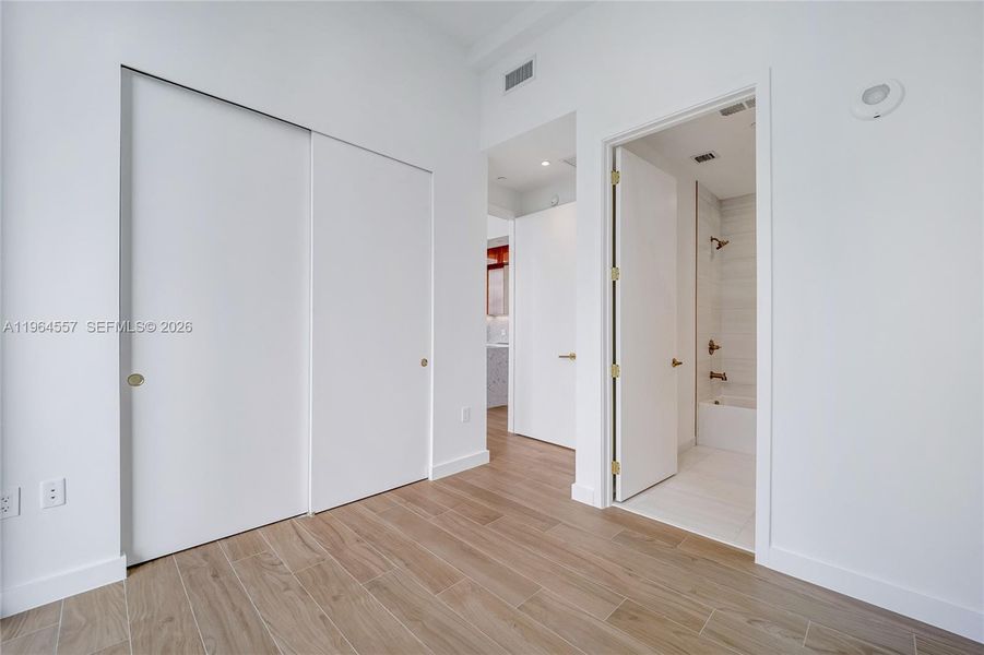 Spacious, unfurnished interior of a new home in Mr. C Residences, Miami (Image 9).