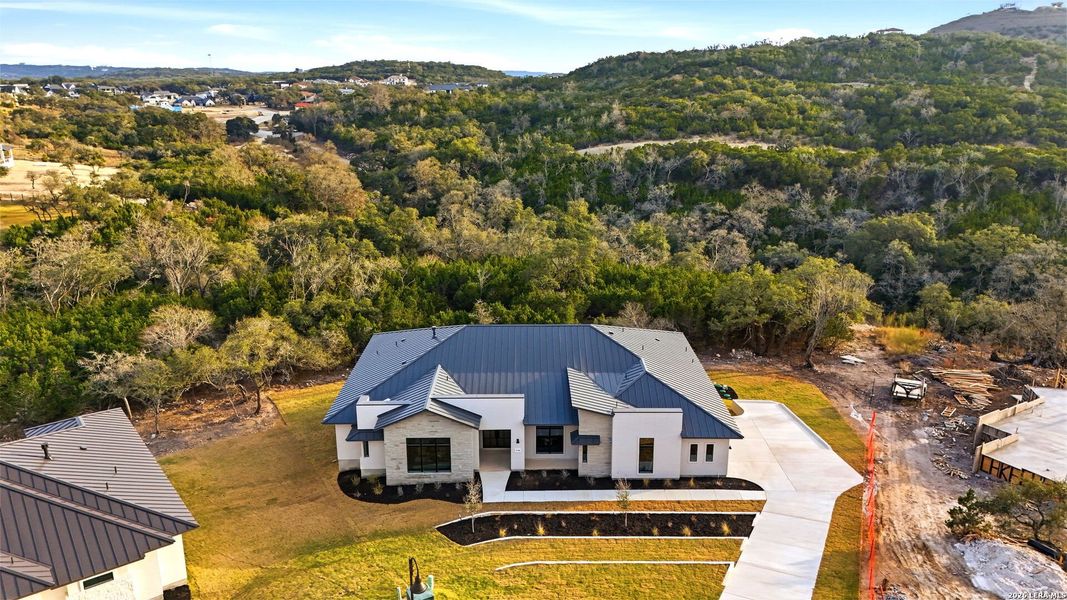Front exterior of a new home in , San Antonio, TX, highlighting curb appeal (Image 26). Front exterior of a new home in , San Antonio, TX, highlighting curb appeal (Image 26).